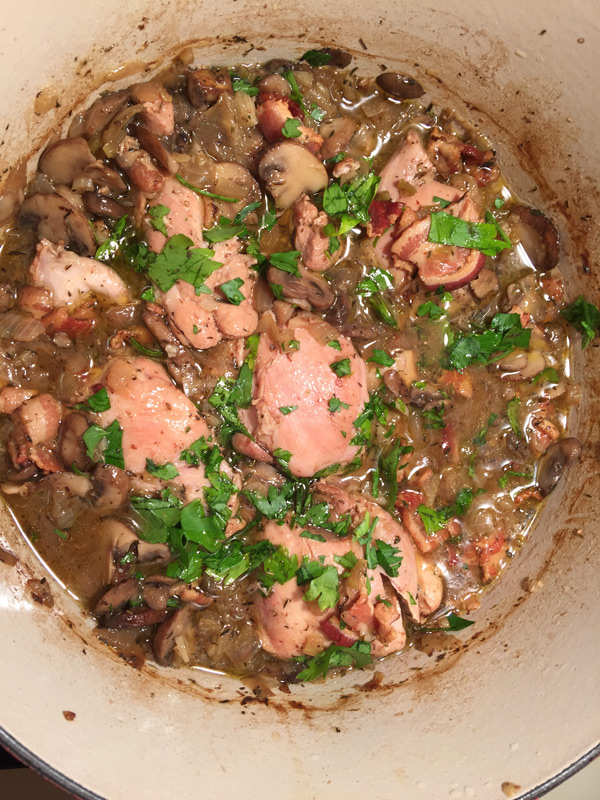 Chicken dish straight out of the oven with an herb on top