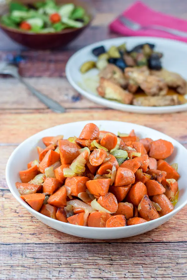 A bowl of sauteed carrots ready to be served with a main dish! So delicious
