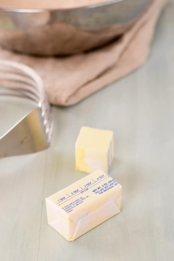 Butter and a pastry blender on the table