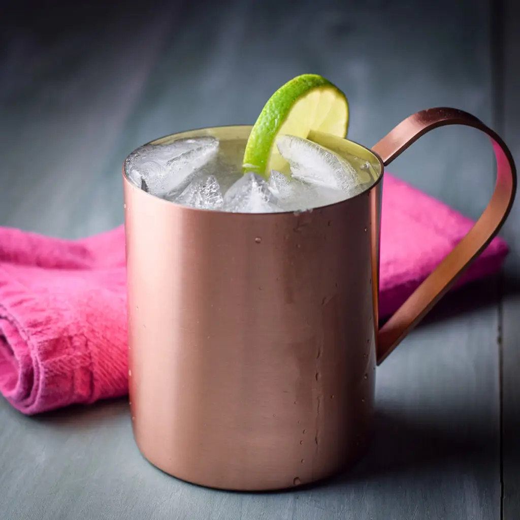 A square photo of a copper mug filled with the mule drink
