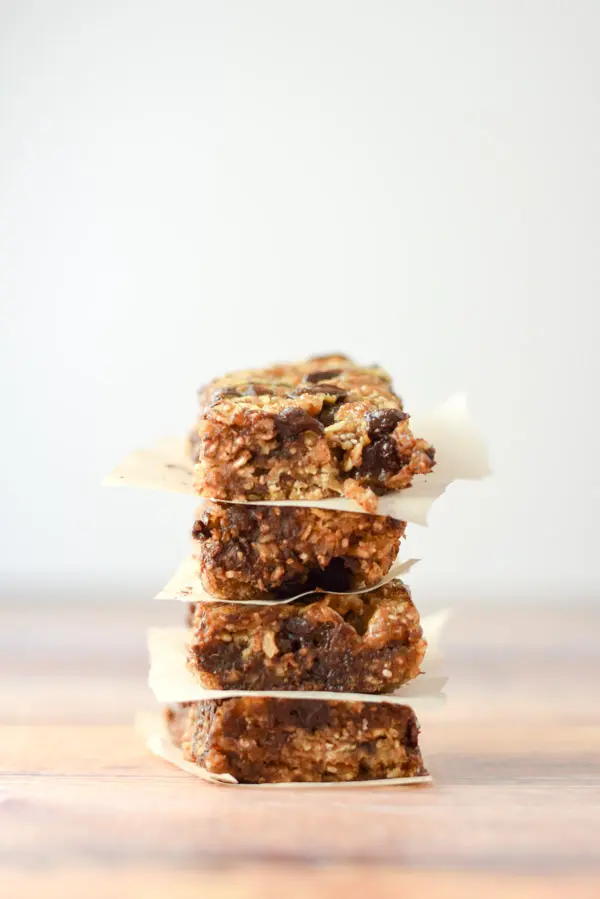 Vertical view of the granola bars stacked with paper between them