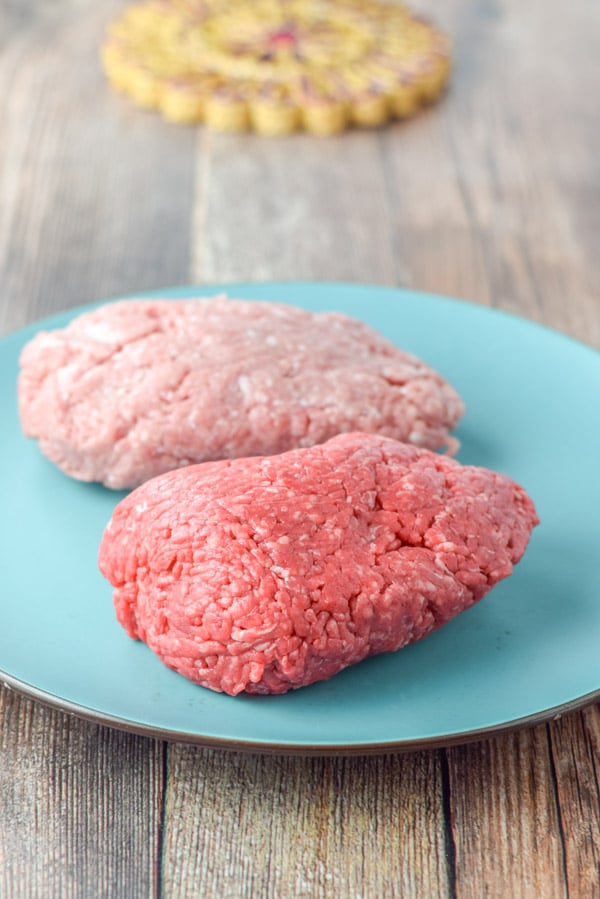 Beef and pork on a blue platter