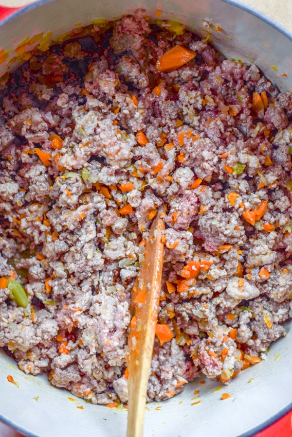 Overhead view of a pan with meat saut&eacute;d in it