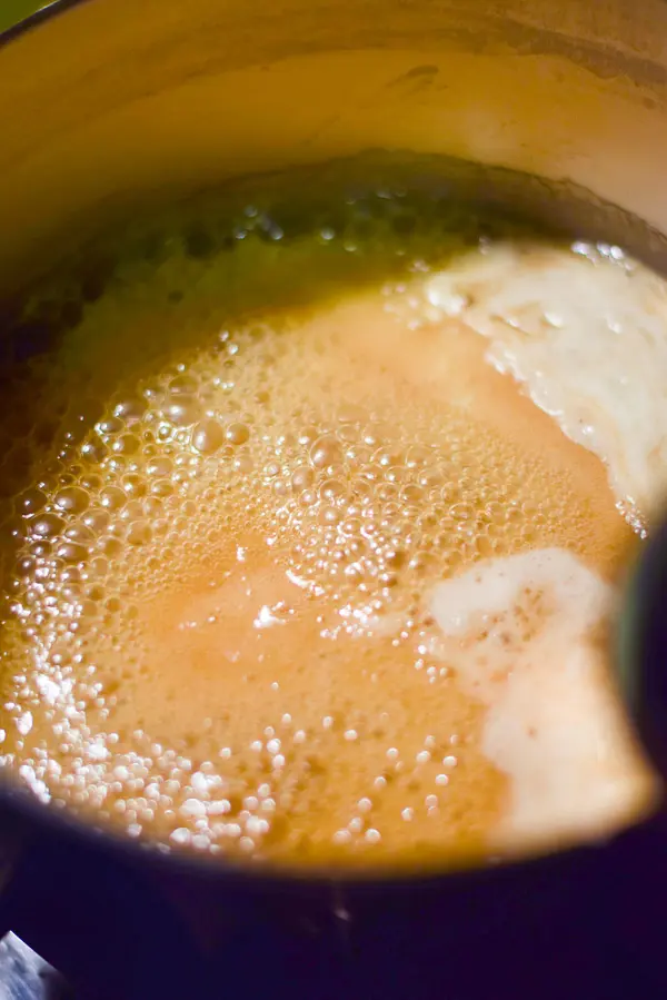 Bubbly cream and butter in the pan