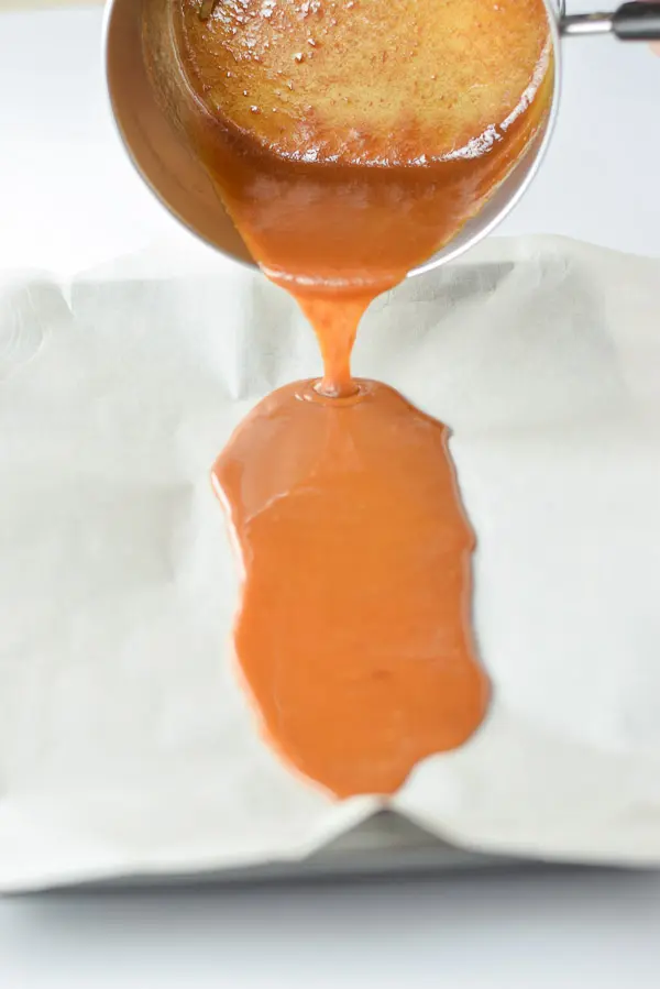 Pouring the caramel on parchment paper