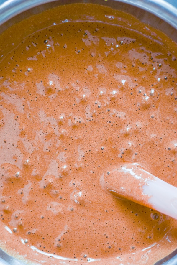 Egg whites folded in with a pink spatula for the mousse