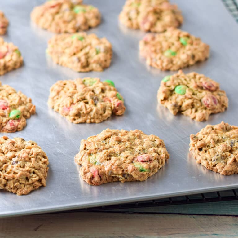 The cookies with M & M's showing still on the cookie sheet cooling - square