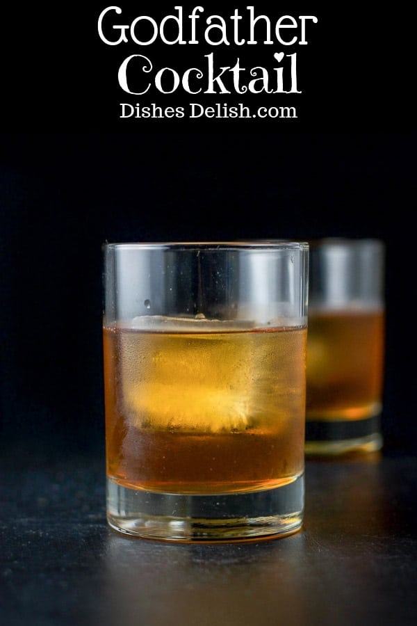 This godfather cocktail only has two ingredients in equal parts which makes it really easy to remember. It's also so delicious!! #godfathercocktail #cocktail #drinks #scotch #dishesdelish https://ddel.co/gfc