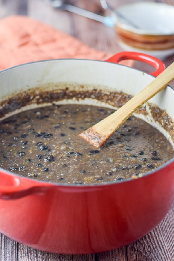 The bean soup finished cooking and still in the red pan