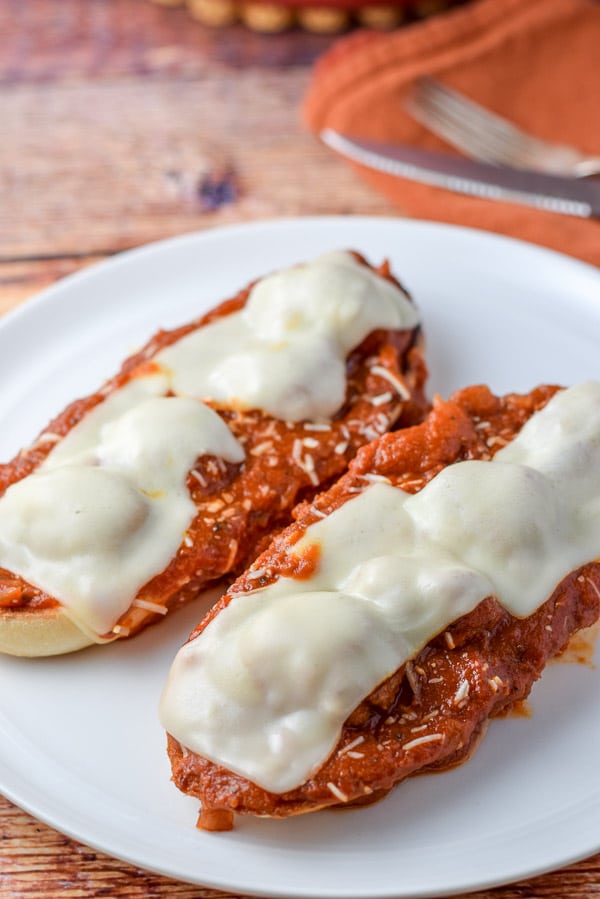 Close up of the melted cheese on the meatballs and sauce filled bread