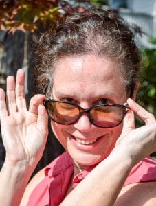 Elaine Benoit looking over her sunglasses
