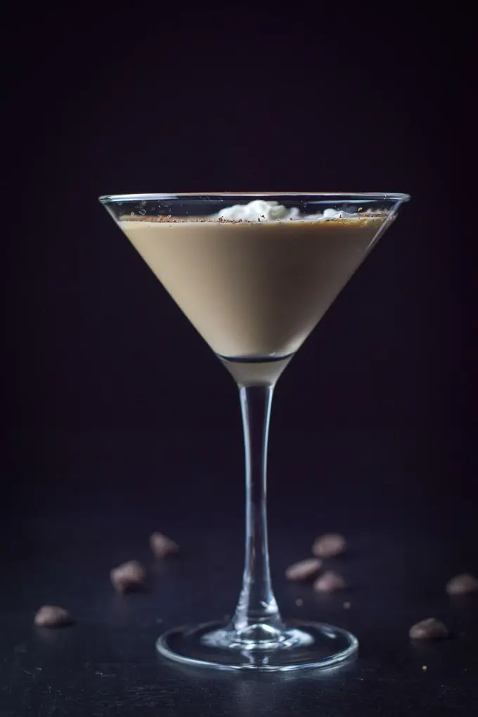 Vertical view of the chocolate cocktail with dollops of whipped cream