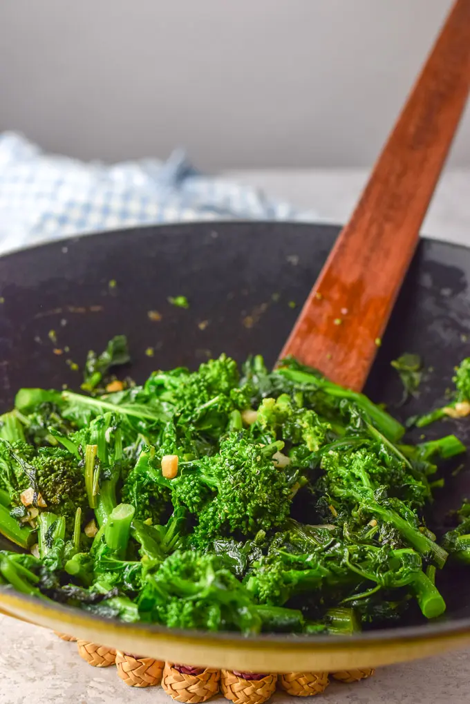 Cooked broccoli rabe in my yellow wok