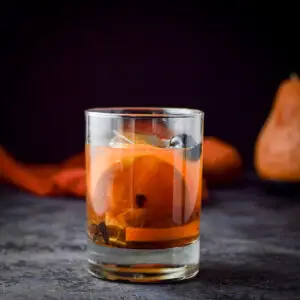 Old fashioned cocktail in vertical view - square