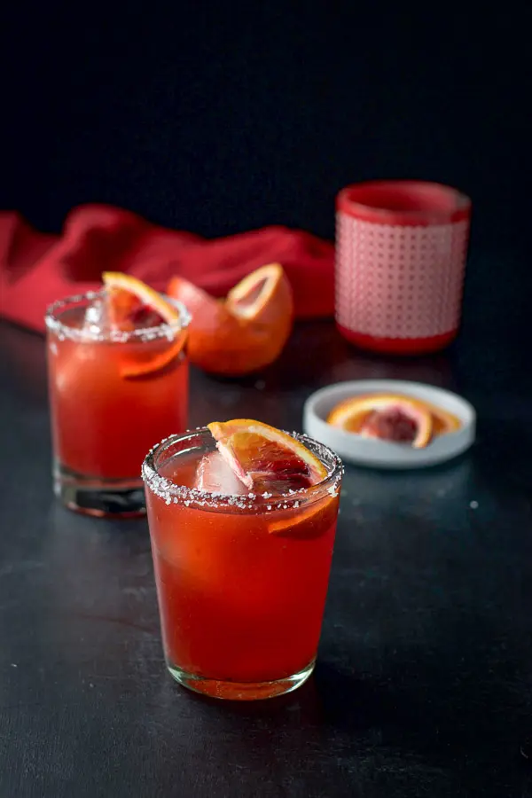Another view of the red margaritas with blood oranges in it and more oranges in the background