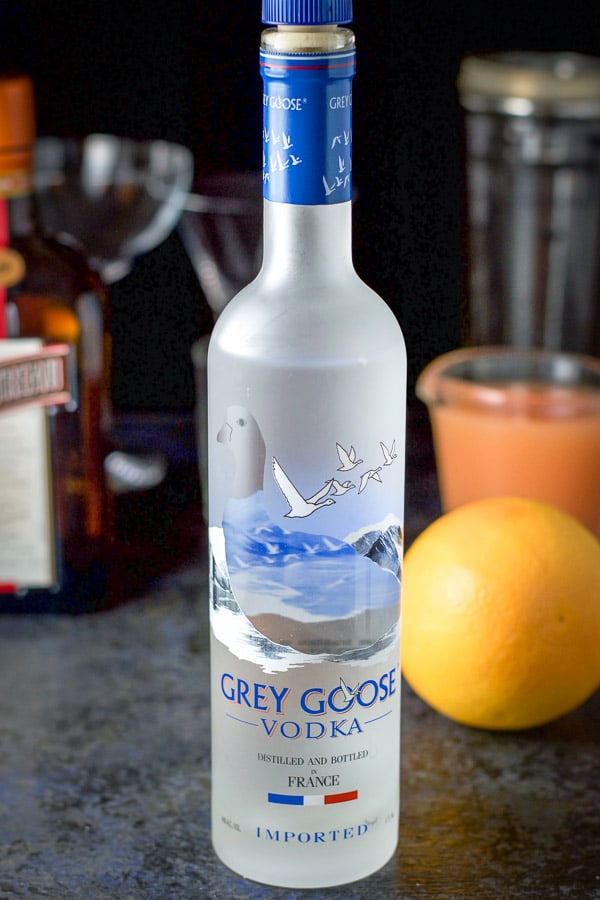 Vodka, grapefruit juice, Cointreau and glasses for the cosmo