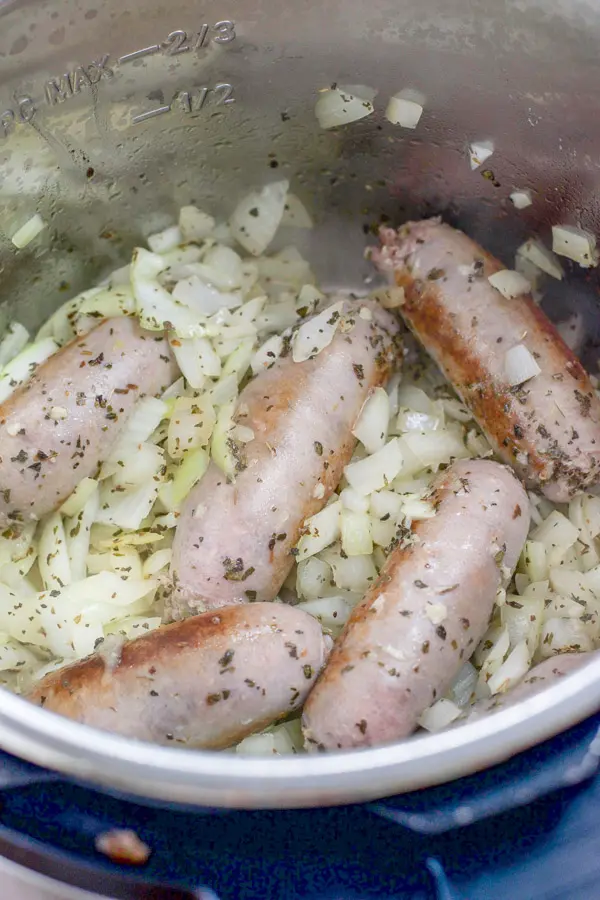 Sausages, onions and herbs sautéed in the instant pot container