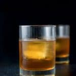 Vertical view of the two glasses of godfather cocktail