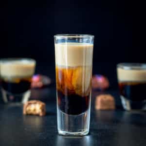Tall glass of snickers shot - square