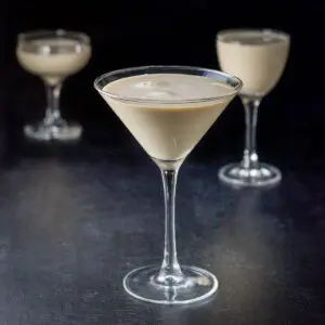 The creamy cocktail in three glasses. A classic glass, a coupe and a Nick and Nora glass - square