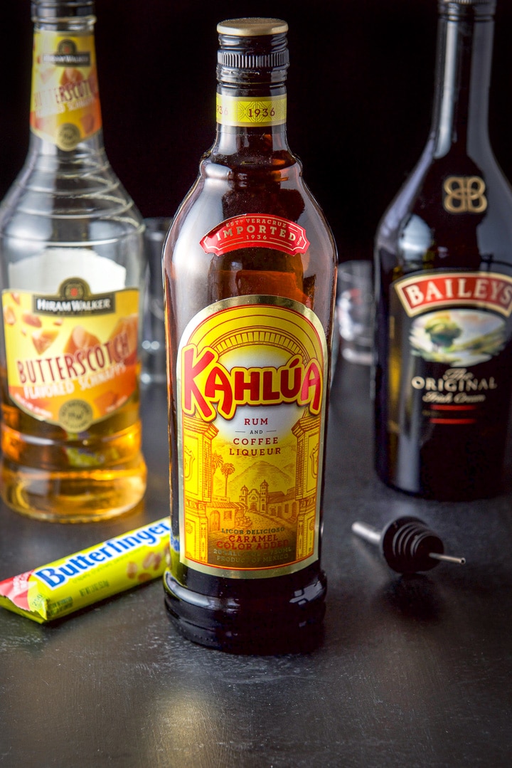 Kahlua, butterscotch schnapps and Baileys Irish cream with a butterfinger bar and glasses