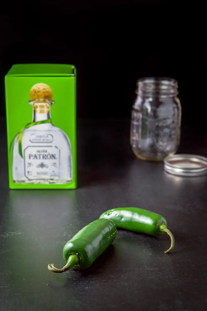 Jalapeños, tequila and a jar for the infused tequila
