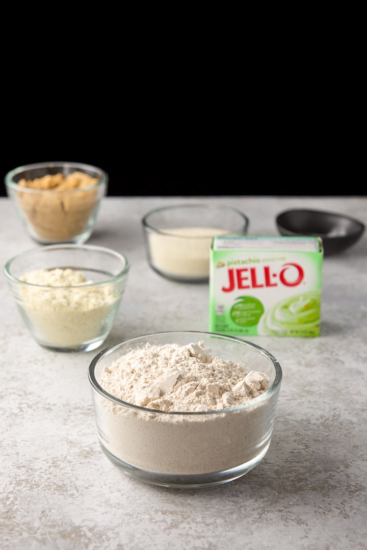 Flour, almond flour, sugars and pudding on a table