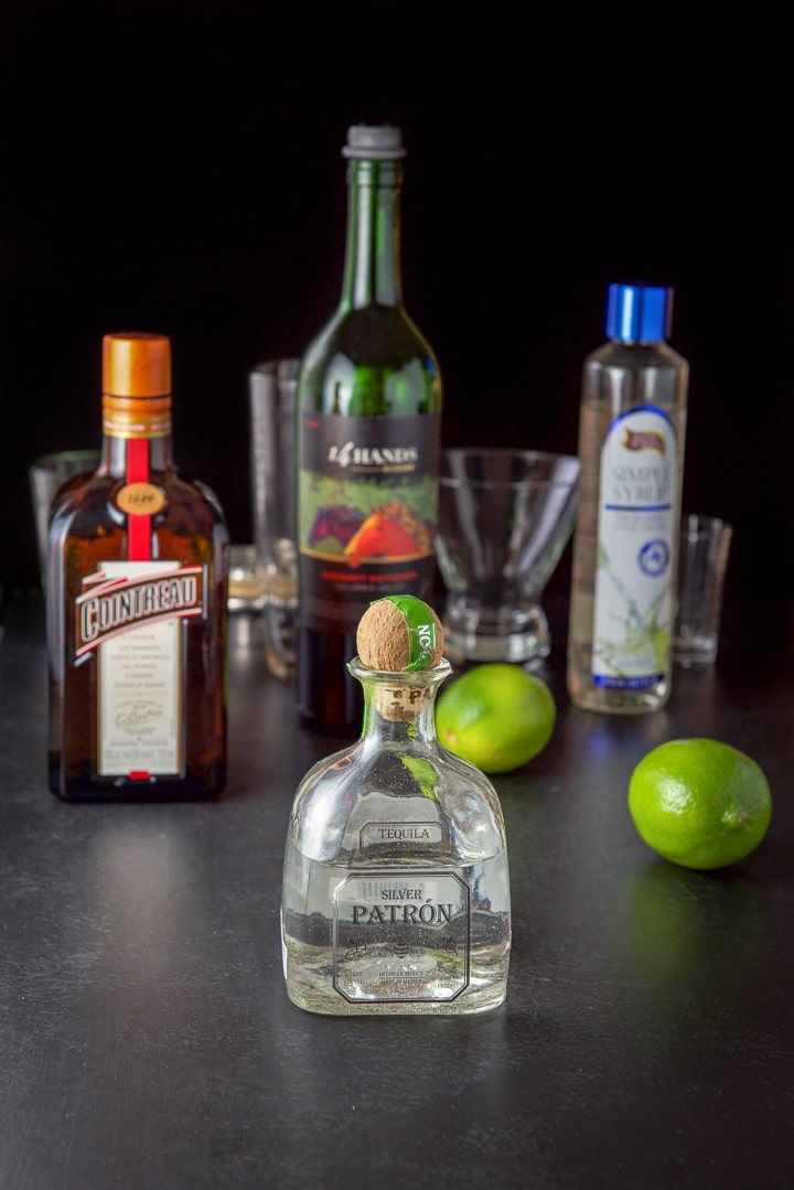 Tequila, Cointreau, simple syrup, limes and wine with the shaker and glassware in the background
