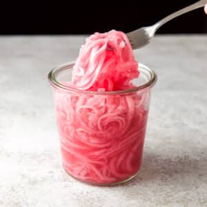 A forkful of Mexican pickled onions - square
