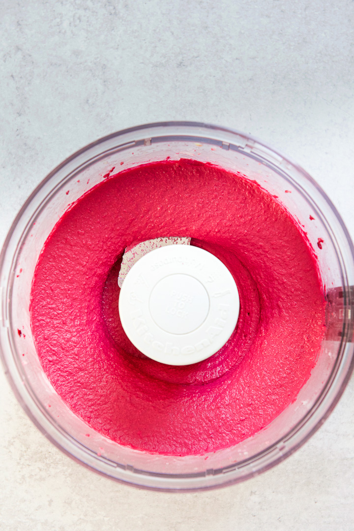 The beet hummus processed in the food processor and ready to eat