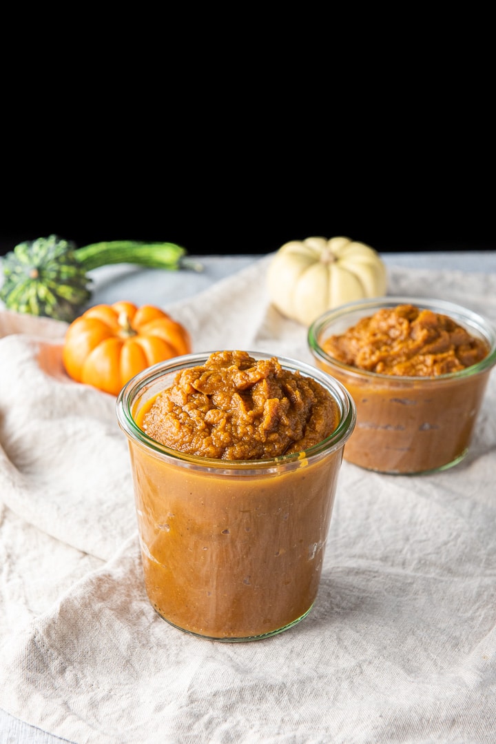 Pumpkin butter in the glass jars with the big jar in front