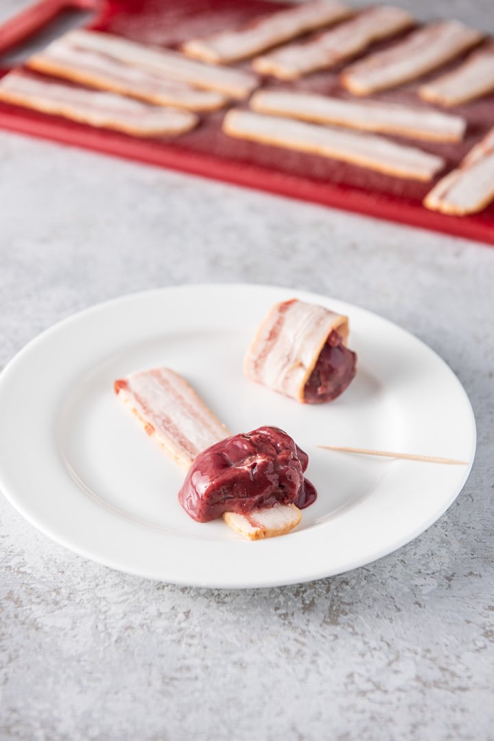 liver on a piece of bacon ready to be rolled up