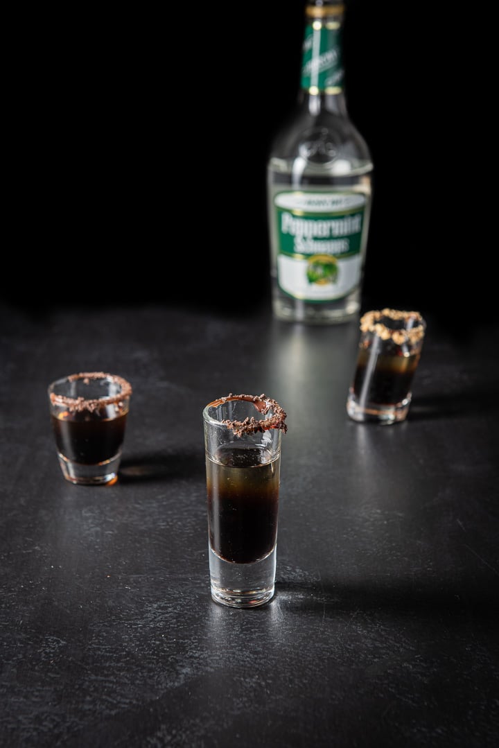 Peppermint schnapps layered in the three glasses