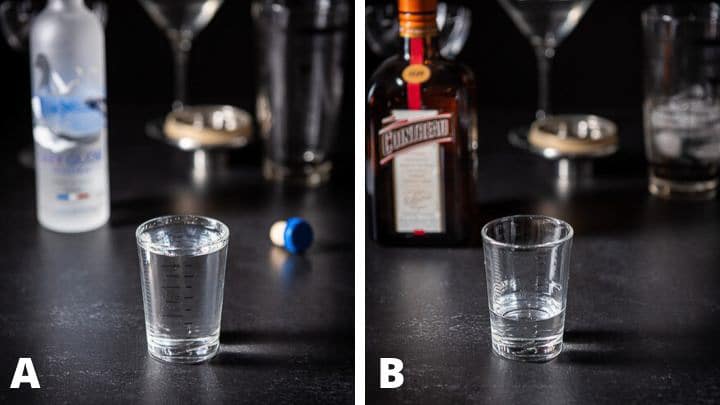 Vodka and Cointreau poured out with the bottles in the background with shakers in the background