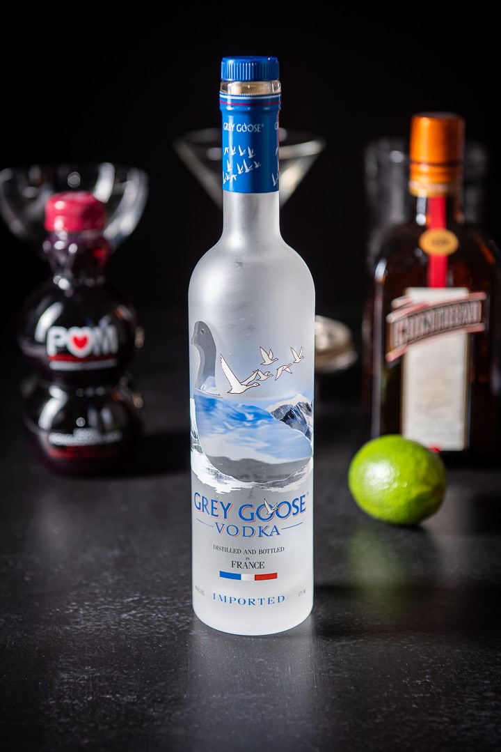 Vodka, Cointreau, lime and pomegranate juice on a table