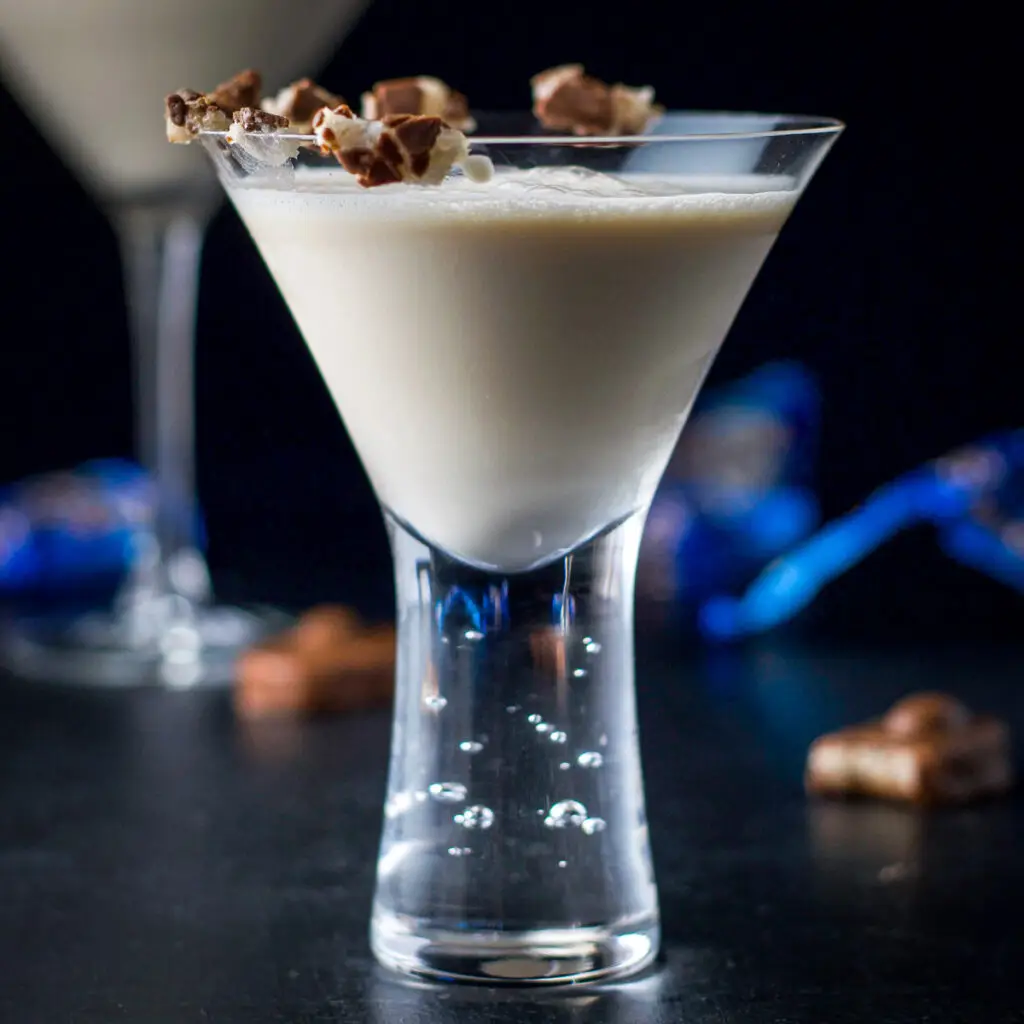 fun bubble martini glass filled with the Almond Joy drink - square