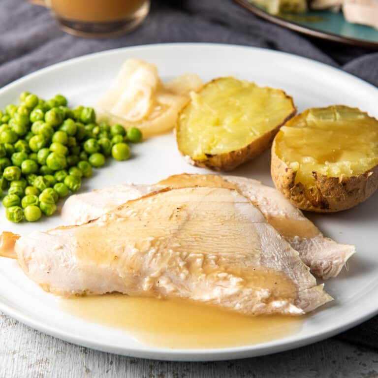 Slices of turkey breast on a plate - square