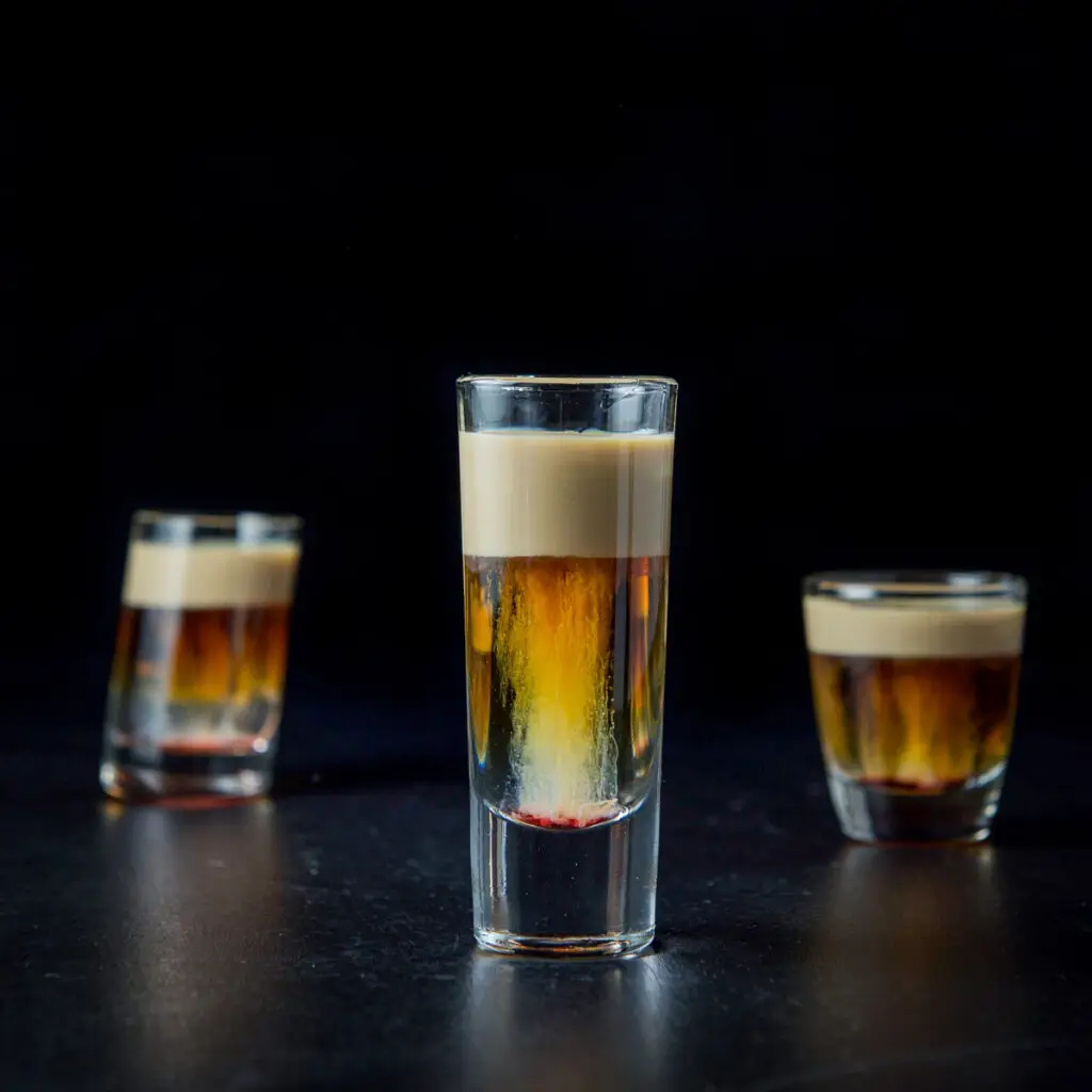 Square photo of the layered shot in the tall glass - square
