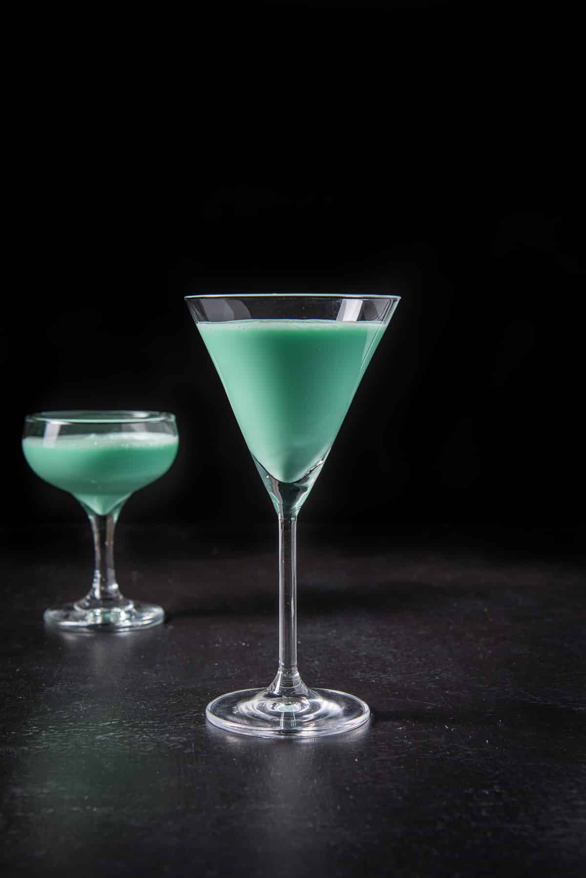 vertical view of the tall martini glass filled with the grasshopper cocktail