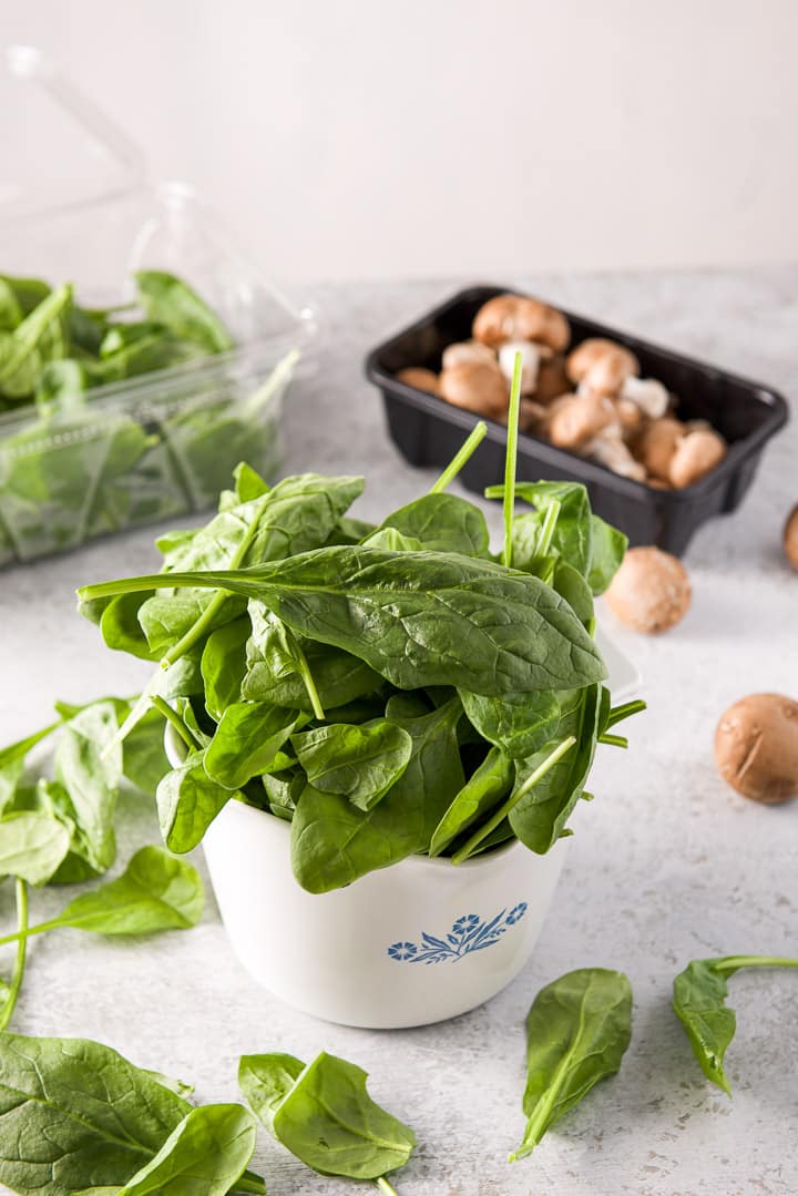 Spinach and mushrooms in a bowl