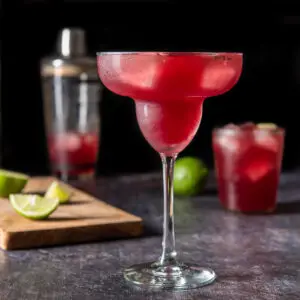 Margarita glass filled with pomegranate margarita - square