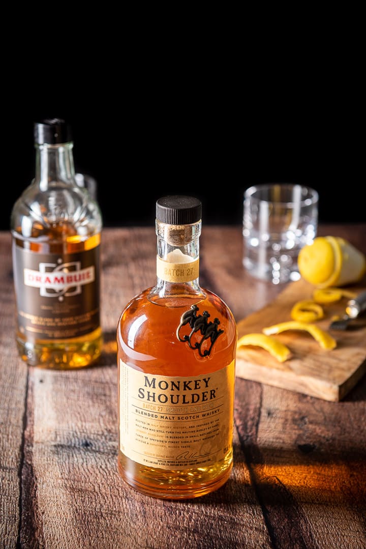 Bottles of scotch and Drambuie on the table