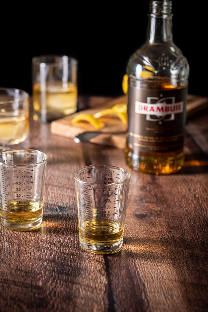 Drambuie poured out and some lemon twists cut