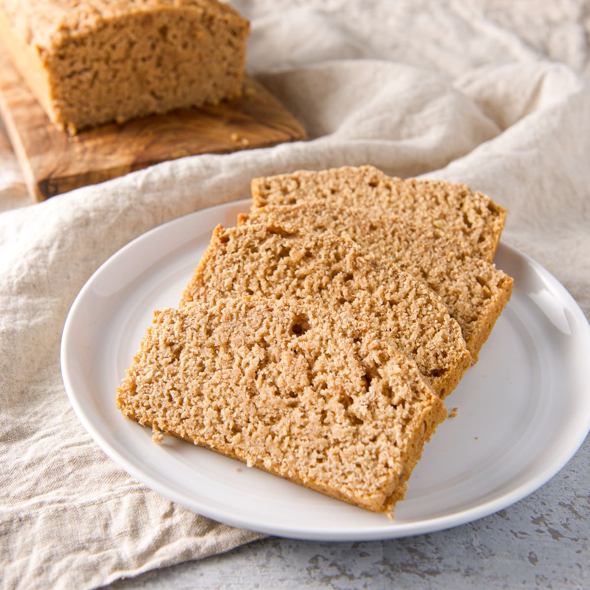 Slices of beer bread on a white plate - square