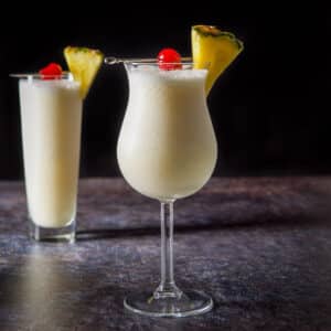 vertical view of the pina colada cocktail in two glasses