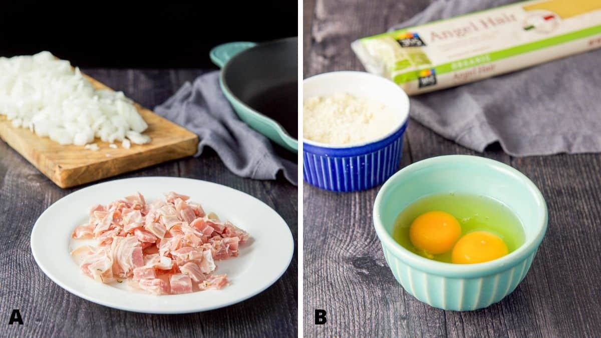 On the left - Pancetta on a plate with chopped onion on a wooden board. On the right - eggs in a green bowl, cheese in a blue bowl and angle hair pasta on the table