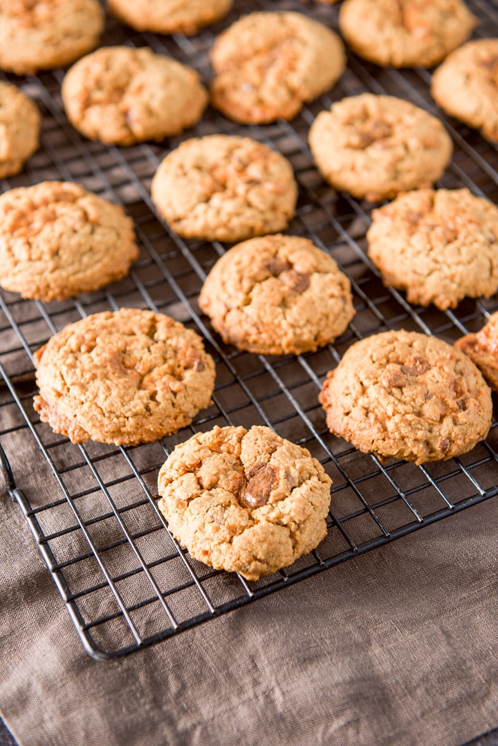 The cookies cooling on a wire rack