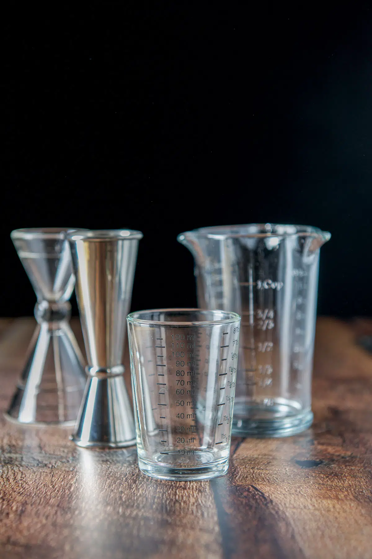 Different jiggers and measuring glasses