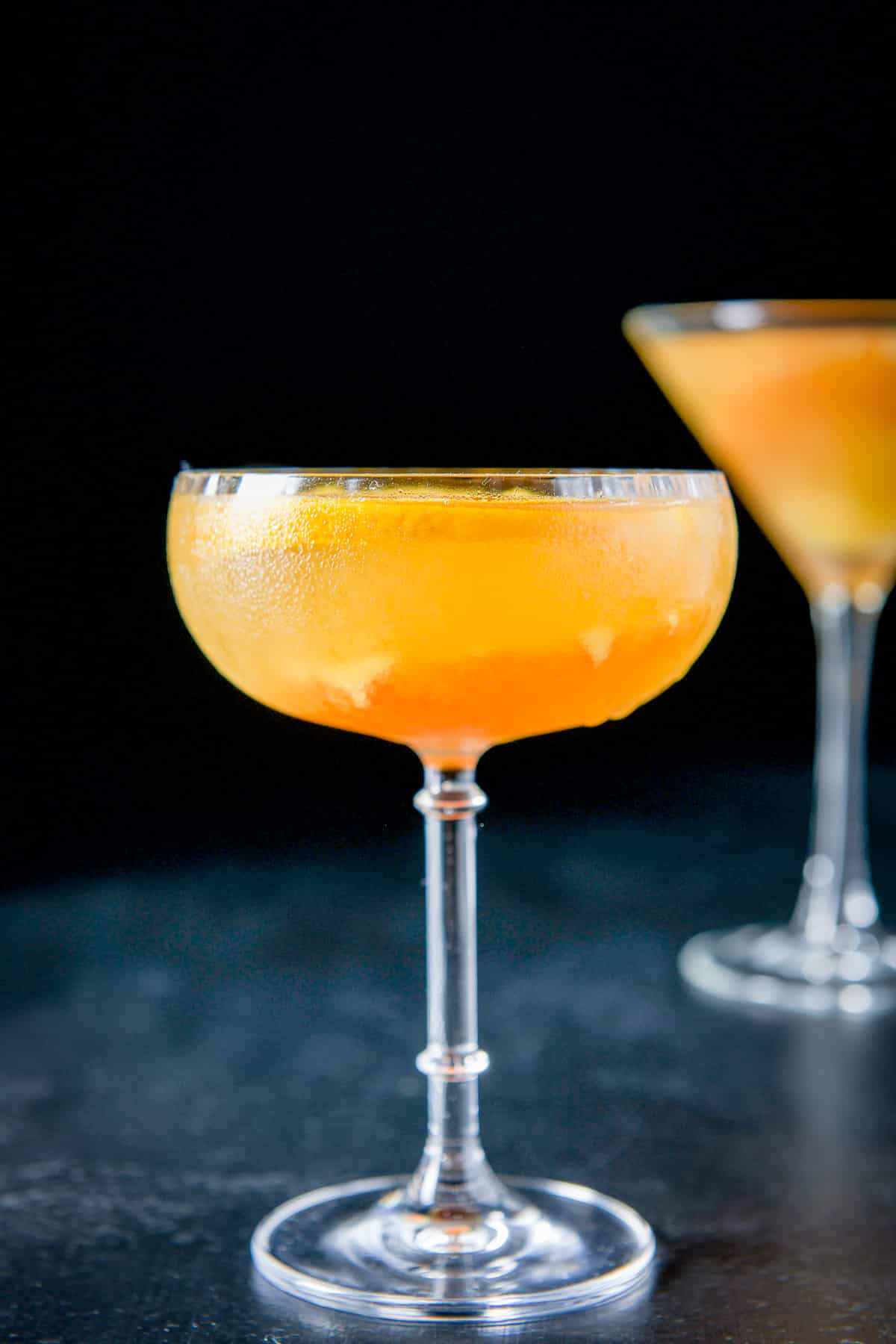 Vertical view of the fluted glass with the Bronx drink in it