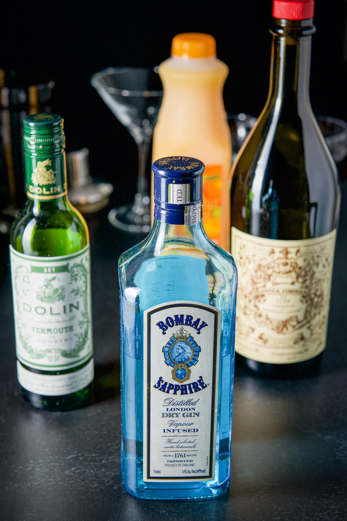 Gin, dry vermouth, sweet vermouth, and orange juice
